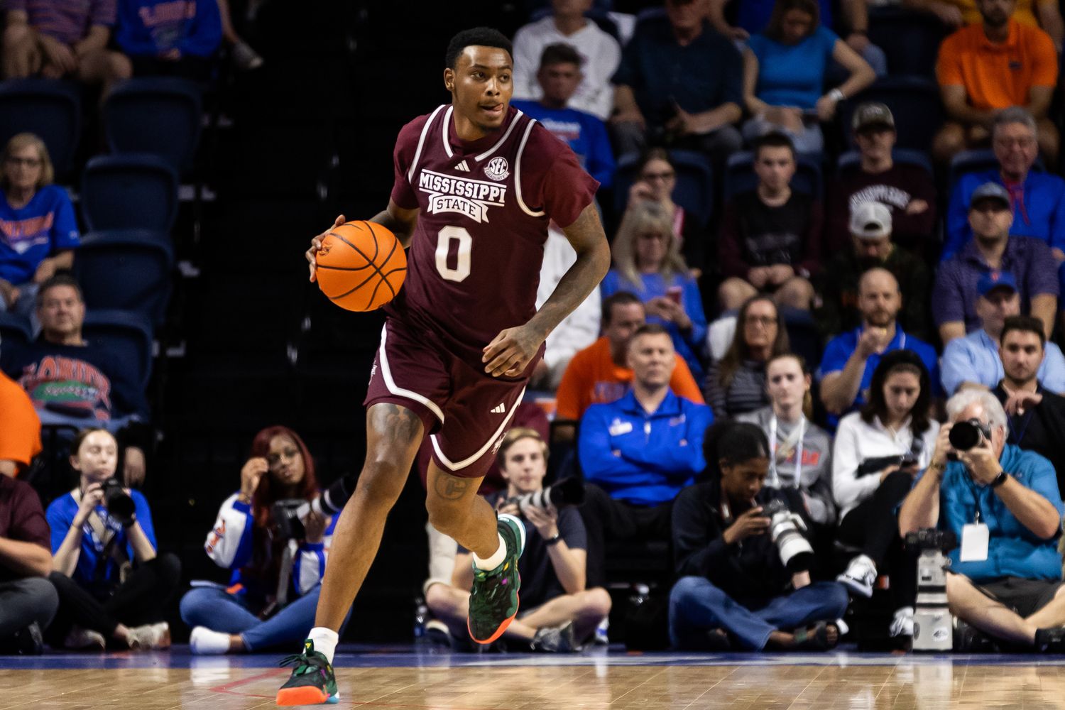 Mississippi State Bulldogs forward D.J. Jeffries (0) dribbles the ball against the Florida Gators during the first half at Exactech Arena at the Stephen C. O'Connell Center